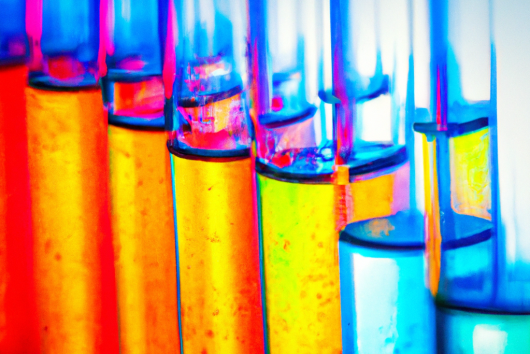 Coloured liquid in test tubes.