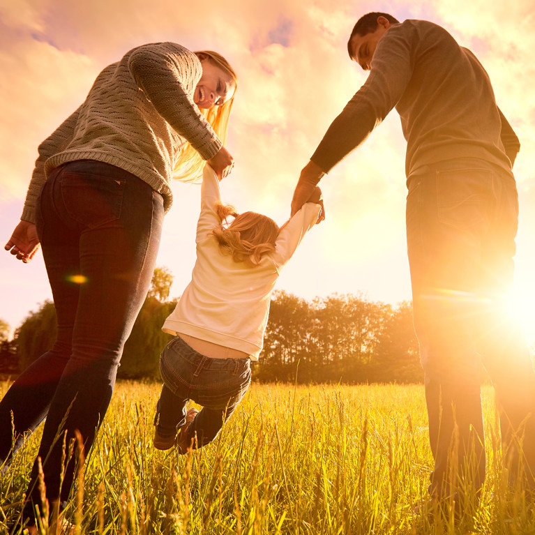 Photo of family in a field