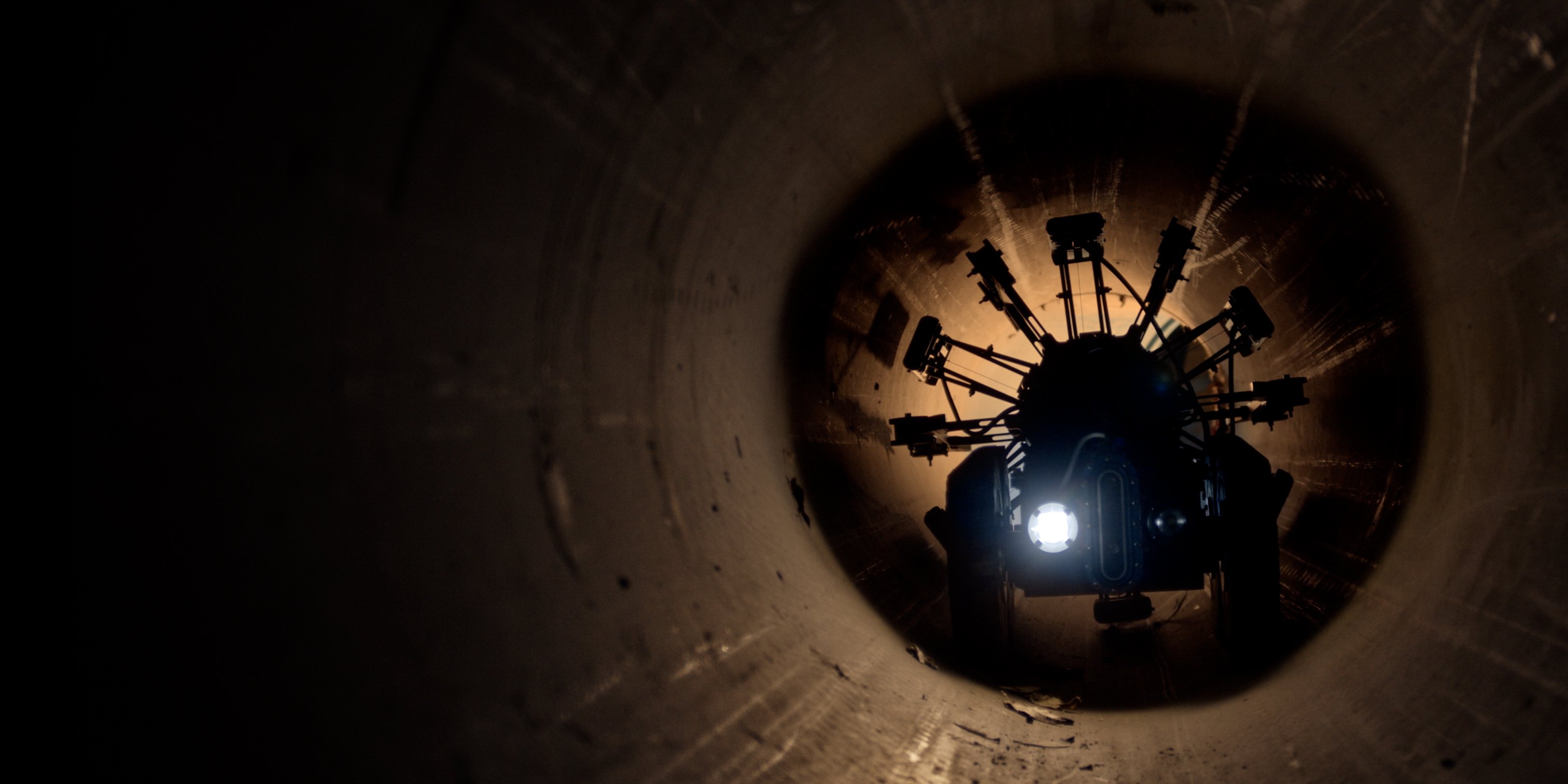 Robot in a large water pipe