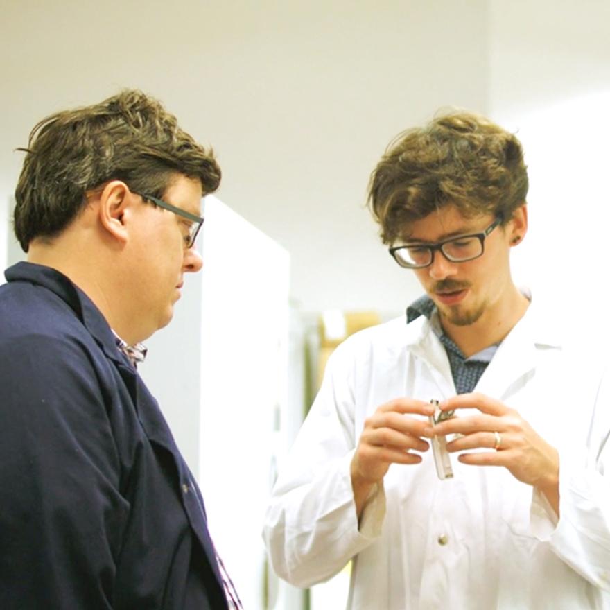 Two men working in a lab