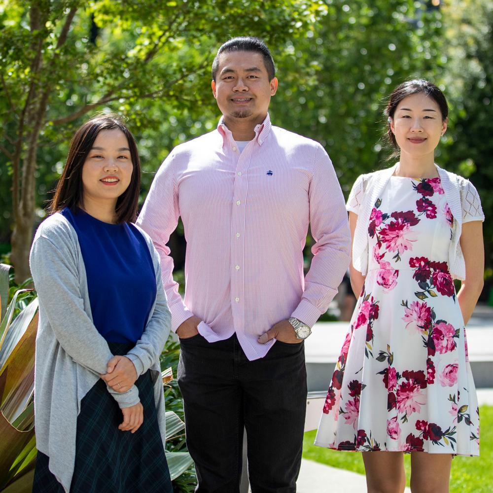 Dr Ying Zhu, Dr Peter Su and DR Jiao Jiao Li, standing in UTS Alumni Green garden