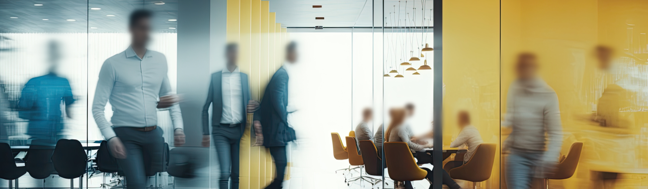 a picture of a crowd in an office, faces are blurred