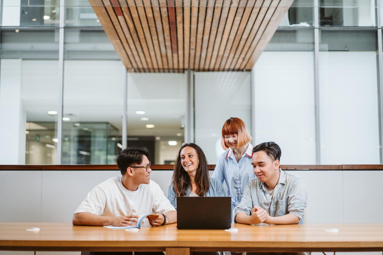 Four UTS students in the FASS building