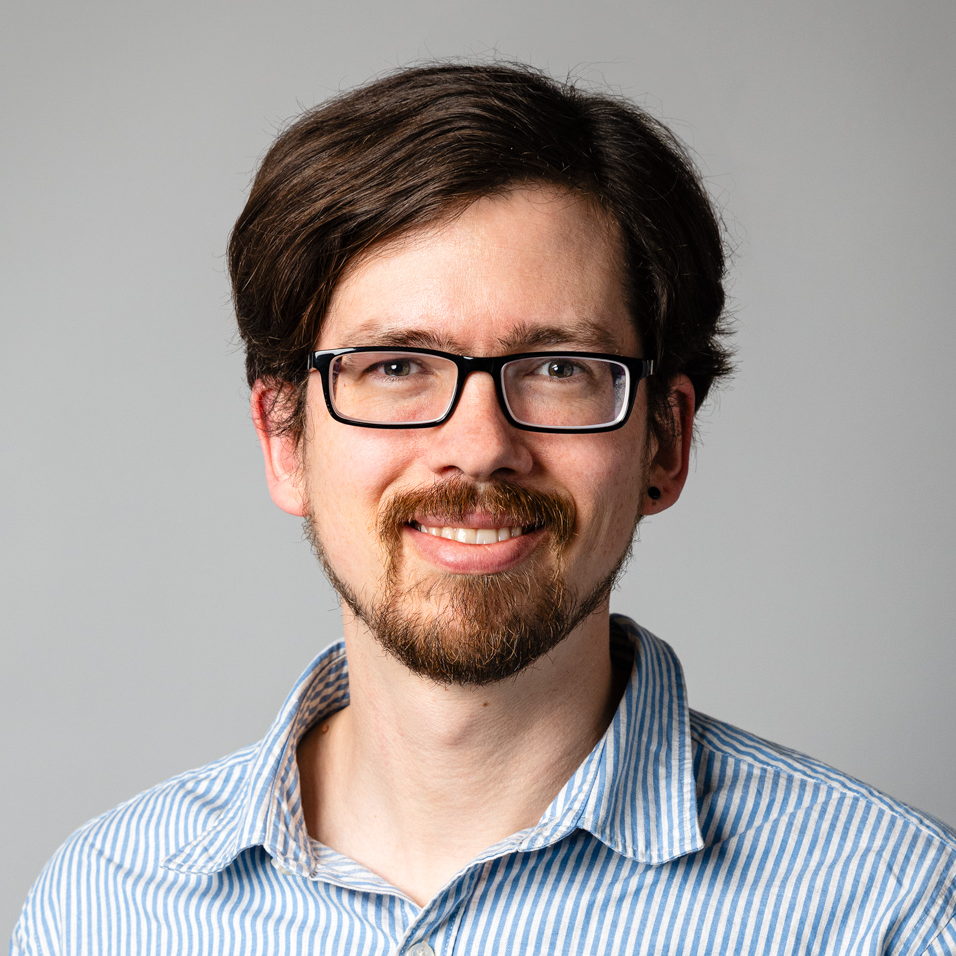 Headshot of Andrew Tovey.