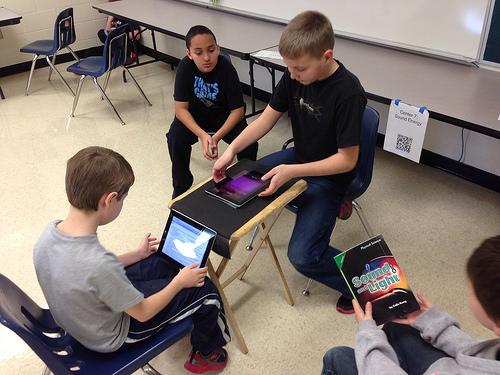 Students use iPads in class