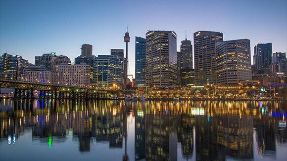 Sydney's Cockle Bay reflected in water at night