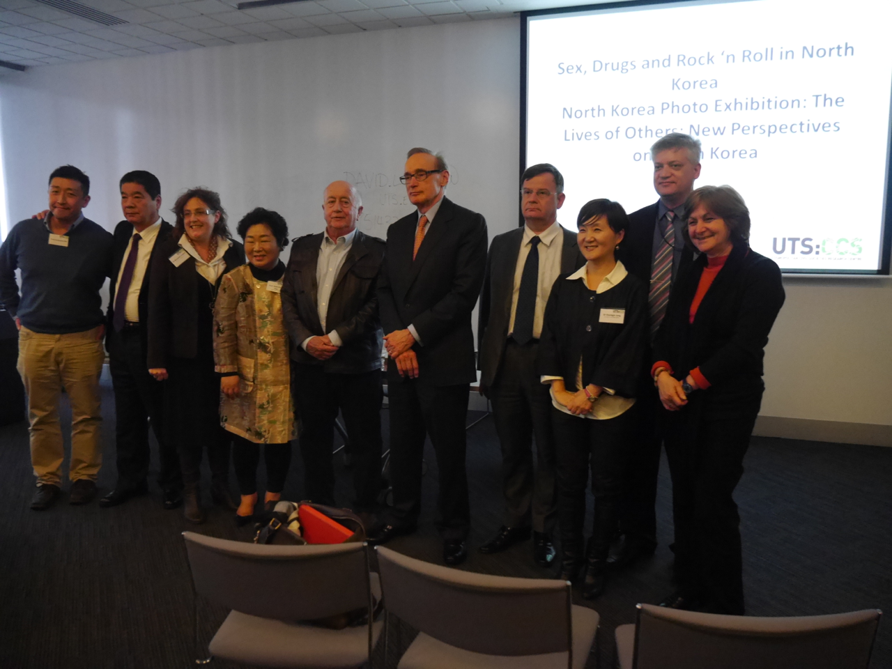 North Korea Exhibition Opening group photo with Bob Carr