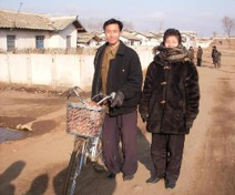 north korea husband wife bike