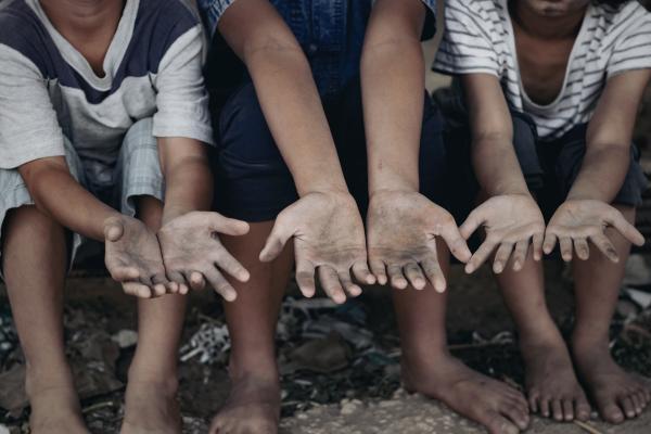 Image of hands of children labor