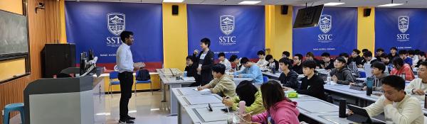 An academic addresses a class at SSTC