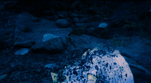 A digital image of a rocky terrain in hues of blue