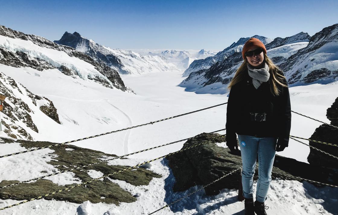 Photo of Kristen on a snowy mountain
