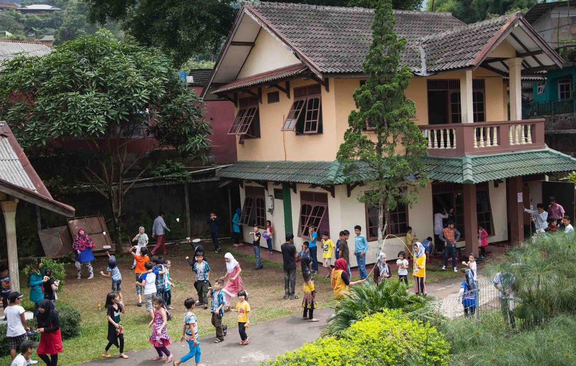 Photo of children playing at the Cisarua Refugee Learning Centre