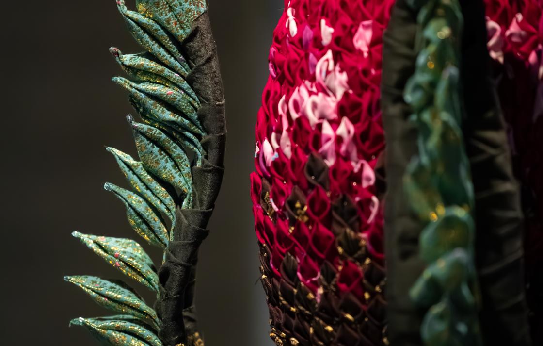 A close up image of a sculptural object made of textiles