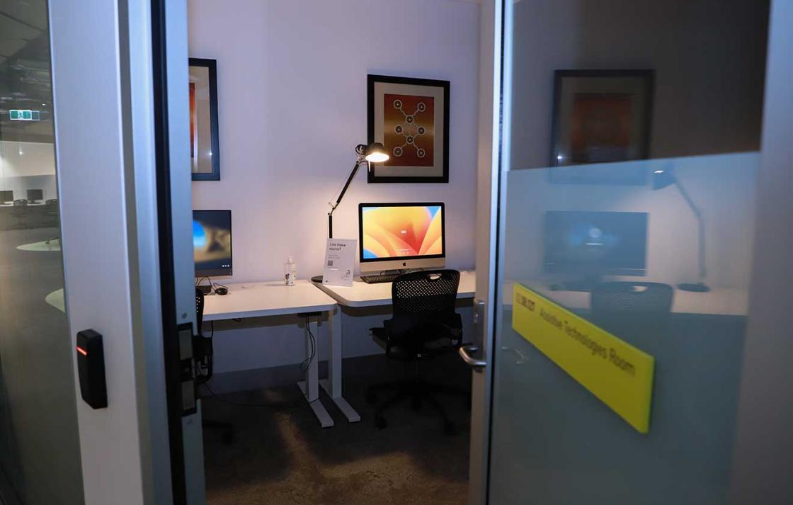 View into a room with computer on a desk