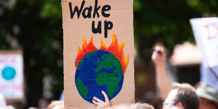 "Wake up": Placard at a climate change demonstration 