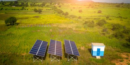 Aerial drone shot of solar panels as a renewable energy source in remote areas of Tanzania