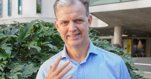 Portrait of Glen Babington with one painted nail