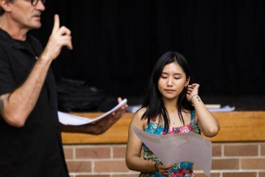 Vivian Pham sits with a script