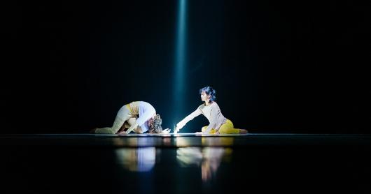 two dancers on a stage