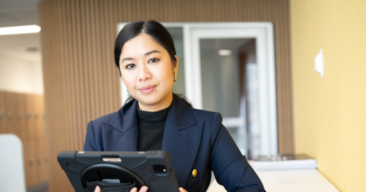 Woman holding ipad