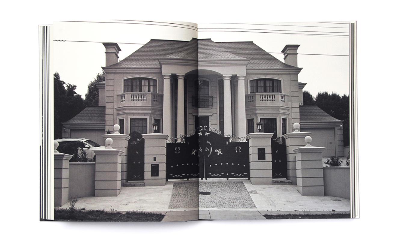 Internal page spread: After the Australian Ugliness. Black and white photo of palatial suburban mansion.