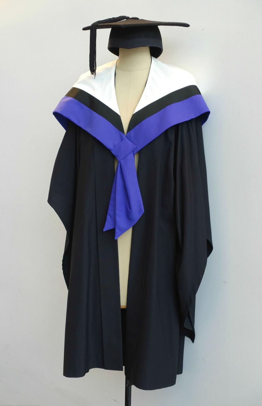 Black Bachelor gown, amethyst Graduate Diploma hood for Faculty of Law and a black trencher