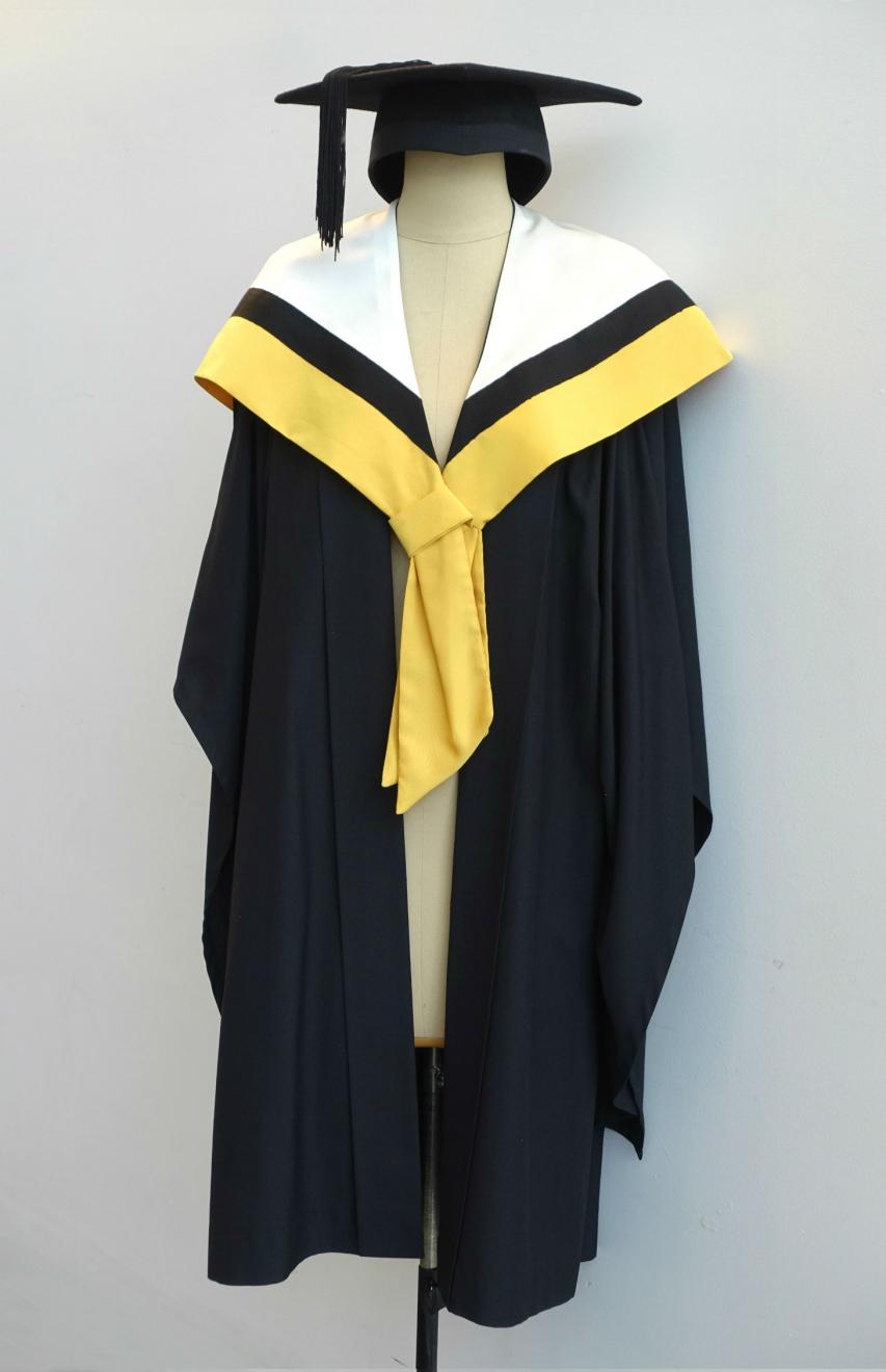 Black Bachelor gown, wattle yellow Graduate Diploma hood for Faculty of Science and a black trencher