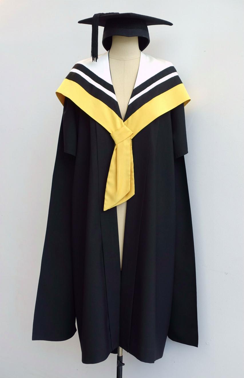 Black Master gown, wattle yellow Master hood for Faculty of Science and a black trencher