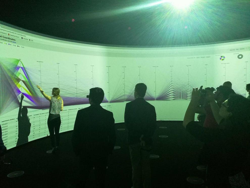 Photo: UTS student Natalia Savinova presenting her data analytics Capstone in the Data Arena to UTS and Ericsson senior management