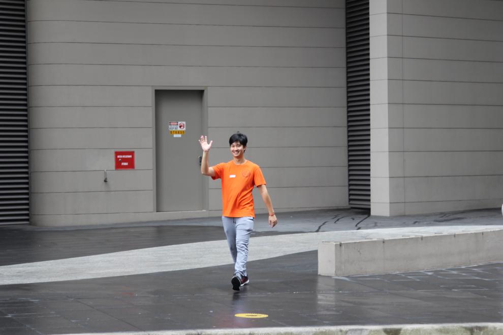 A Peer Networker walking across the road