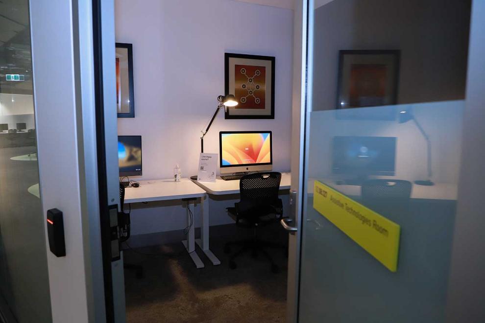 View into a room with computer on a desk