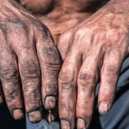 Image of coal workers hands