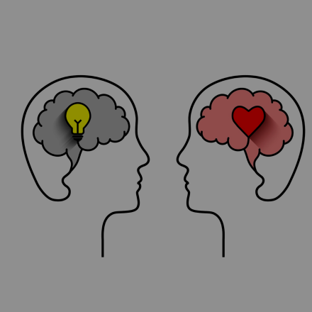 Line art of two facing heads with light bulb and heart in front of brain