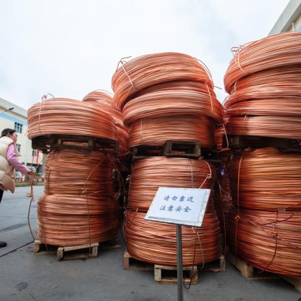 Bales of copper wires are stacked inside the workshop of the Large Copper Manufacturing Company