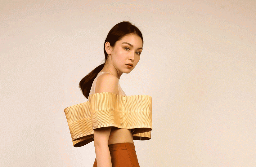 Model wearing laser cut design by Jessica Xie