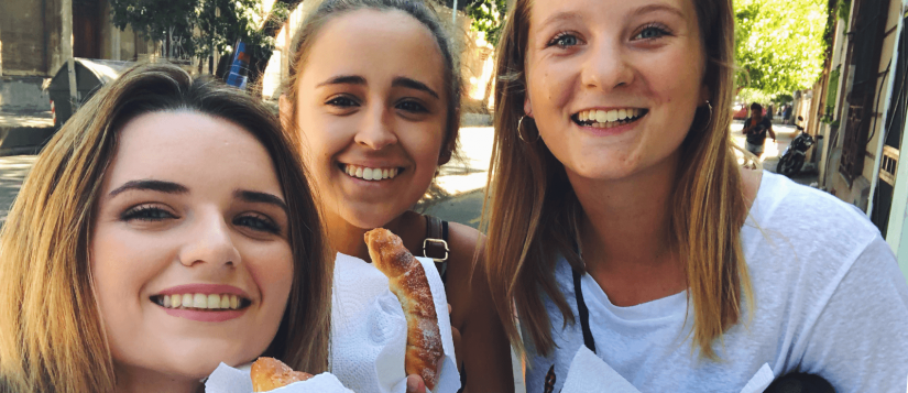 Alana and her friends eating pastries