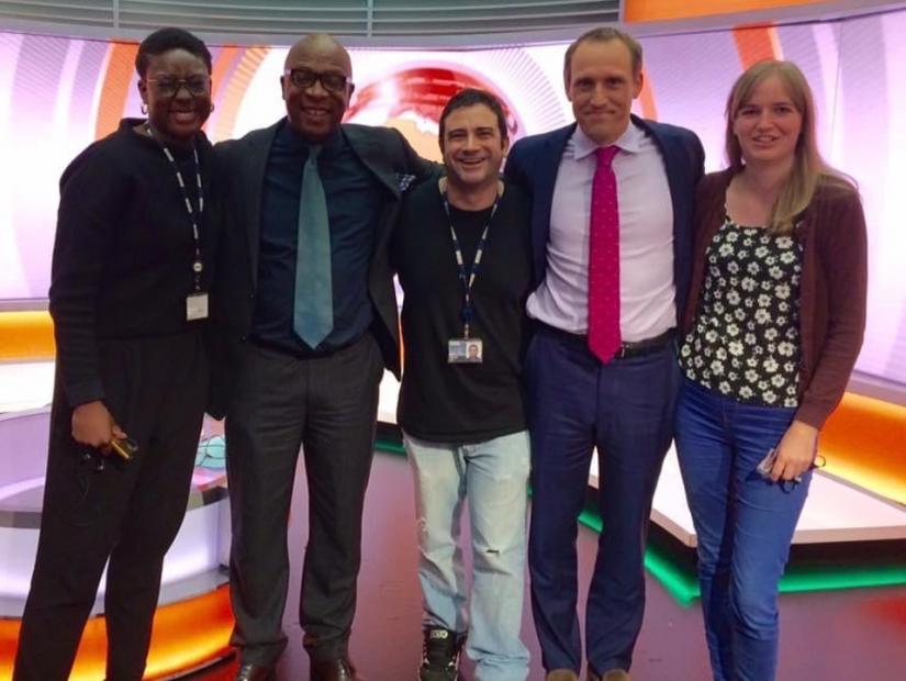 Seref Isler - Senior Producer for BBC World program Focus on Africa - with four fellow journalists from the Program - two men and two women