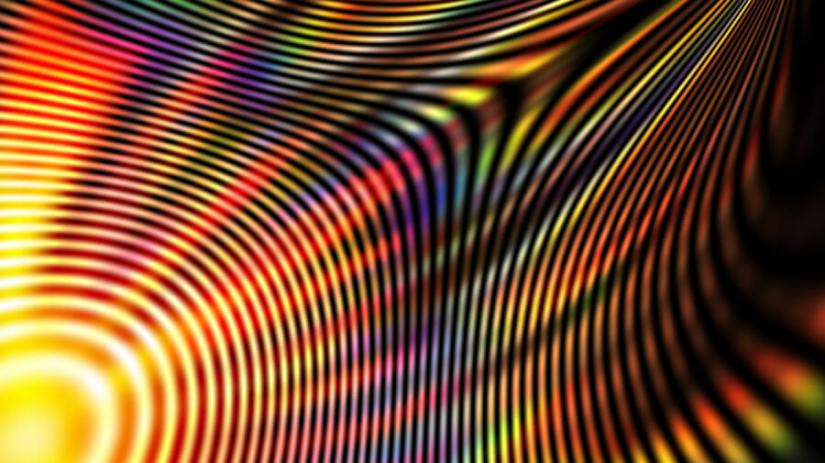 colourful interference pattern from a single point in yellow