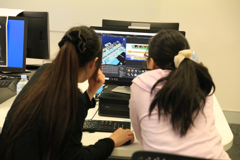 School students working on game design.