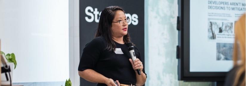 After two weeks of finessing her business pitch, Julie Leung presents her solar building panel technology at the Green Sprint Pitch Night. Image: YeahRad