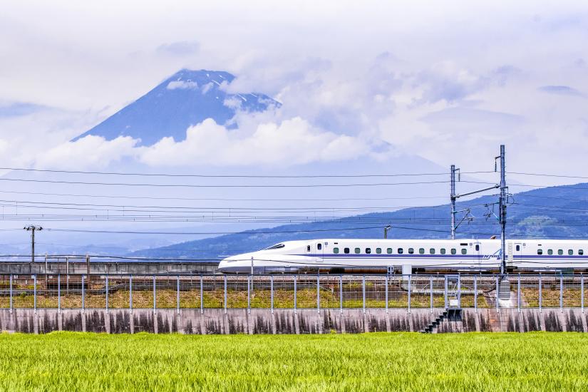 High Speed Train passing Fuji Mountain Background in Summer, Fuji City, Shizuoka, Japan