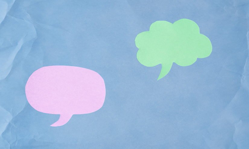 A pink speech bubble and green thought bubble on a blue background