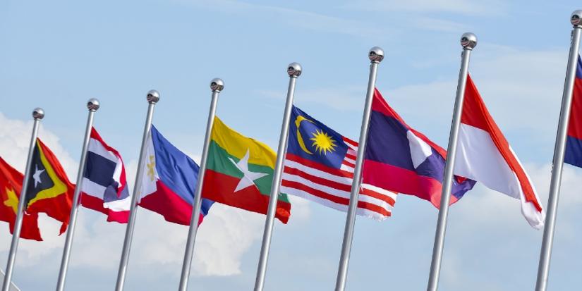Flags of Indo-Pacific countries are raised alongside one another