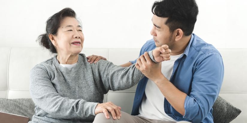 Elderly mum with adult son