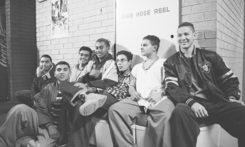 Black and white photograph of A group of youth at a South American night, Whitlam Leisure Centre, Liverpool, 1994.