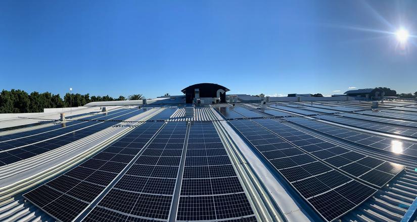 Wide angle photograph of part of the rooftop solar system at Lord St, Botany