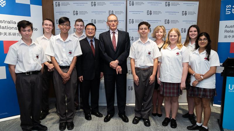Students and teacher attendees with Bob Carr