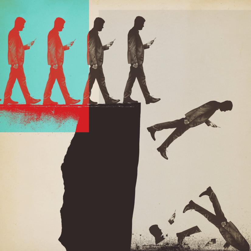 Men falling off a precipice looking at phone