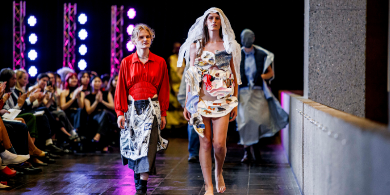 Bridget Matison walks the runway with model wearing one of her designs